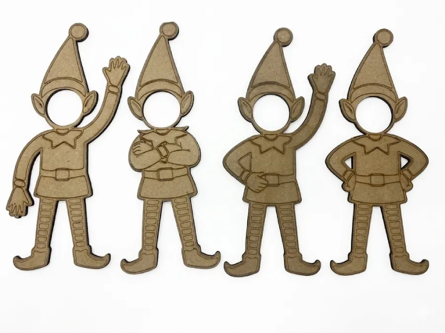 4 lutins magiques découpés dans du MDF. Pour afficher Photo.
